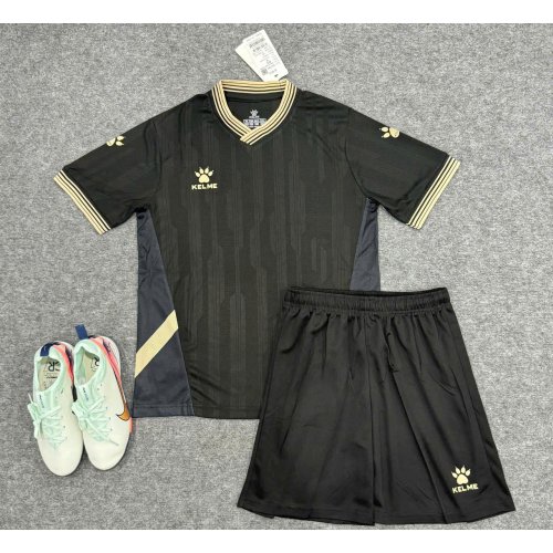 Bộ Quần Áo Bóng Đá Kelme - Đen Viền Vàng Đồng